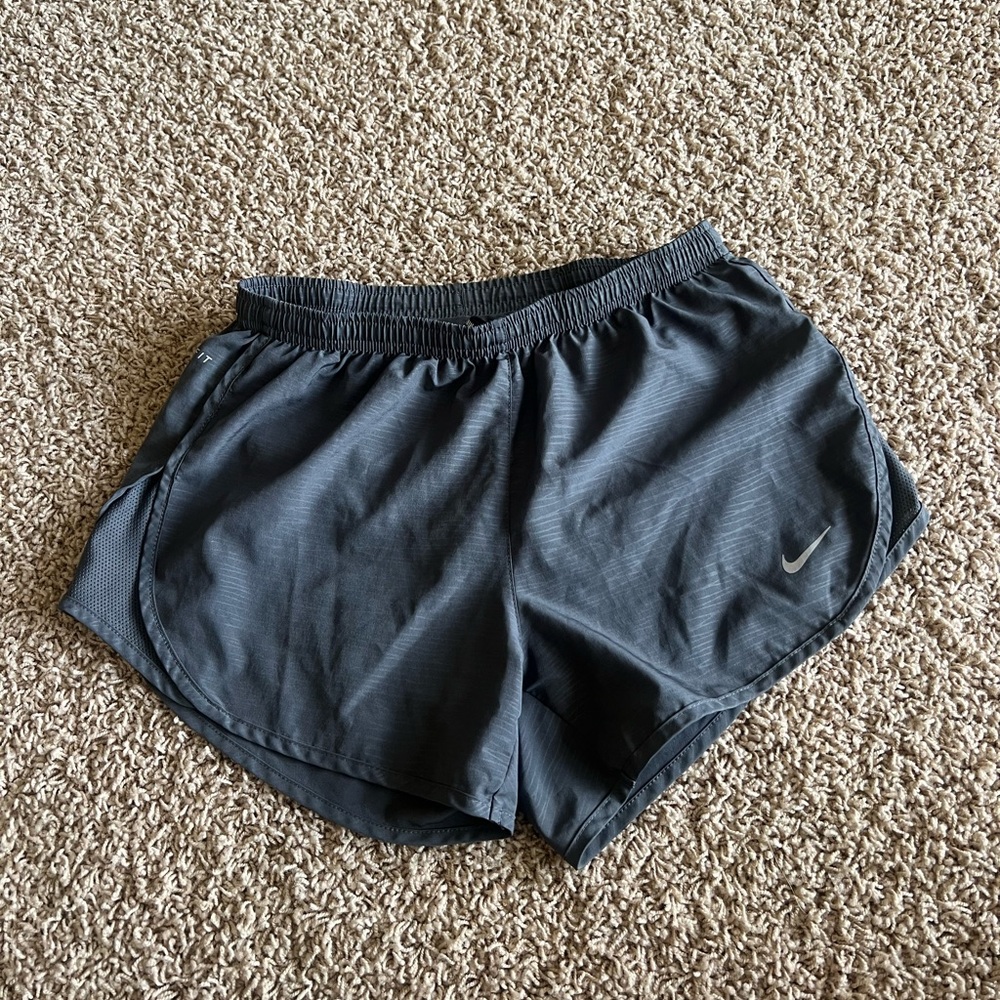 gray nike running shorts. size x-small